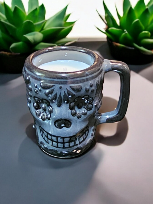The Vela Lady black on black Calavera shot glass soy candle with intricate skull design and handle