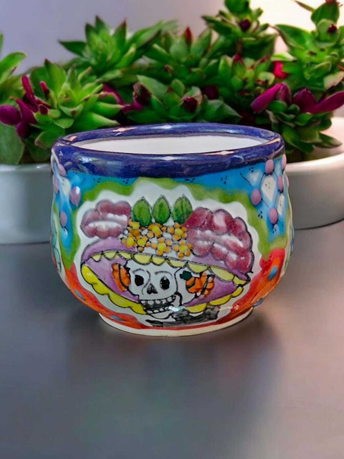 The Vela Lady La Catrina Talavera mug featuring vibrant hand-painted Day of the Dead skull art on ceramic pottery.