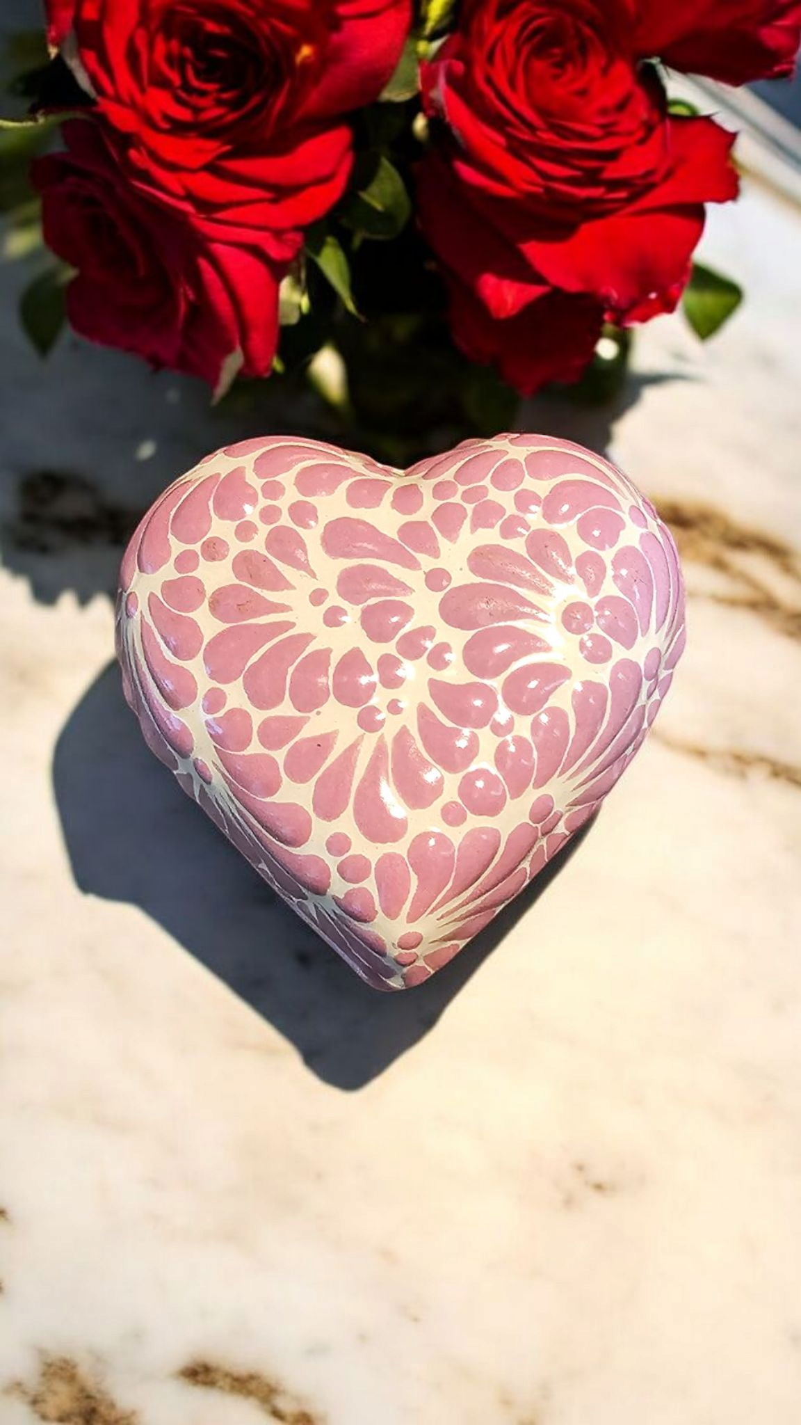 The Vela Lady heart-shaped Talavera ceramic candle holder with purple floral patterns on a white background.