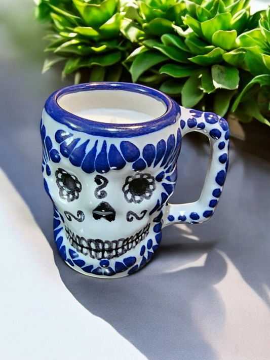 The Vela Lady blue and white hand-painted Talavera ceramic skull shot glass candle with soy wax