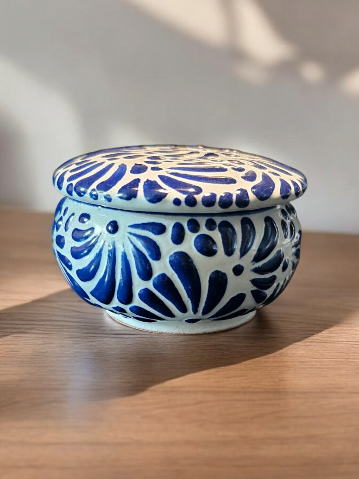 The Vela Lady blue and white Talavera ceramic trinket holder with a lid, featuring traditional hand-painted patterns.